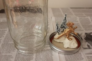 Mason Jar Snow Globes with Gold Dinosaurs